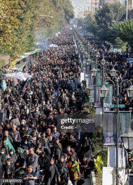 Shiite Muslim devotees gather in Iran's capital Tehran on September 17, 2022 to mark the holy day of Arbaeen , the end of the 40-day mourning period...