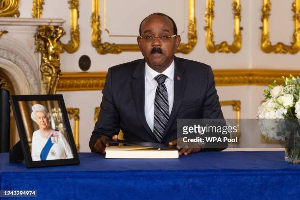 Prime Minister of Antigua and Barbuda, Gaston Browne, signs a book of condolence at Lancaster House following the death of Queen Elizabeth II, on...