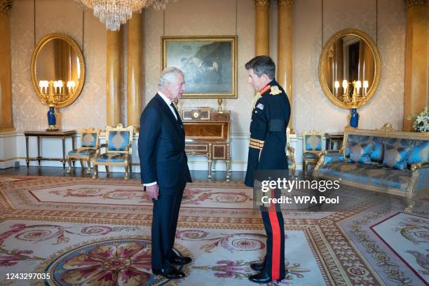 Britain's King Charles III greets Major General Gwyn Jenkins, Vice Chief of Defence Staff during a meeting with military chiefs of staff at...