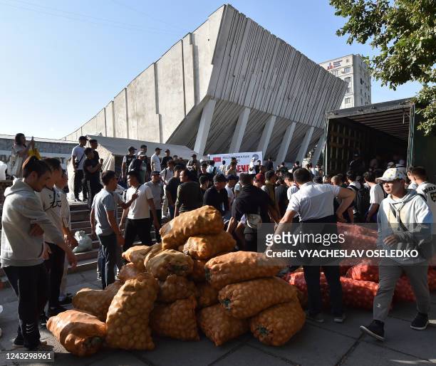 Volunteers collect humanitarian aid for people evacuated from the town of Batken in Bishkek on September 17, 2022. - The Central Asian republics of...