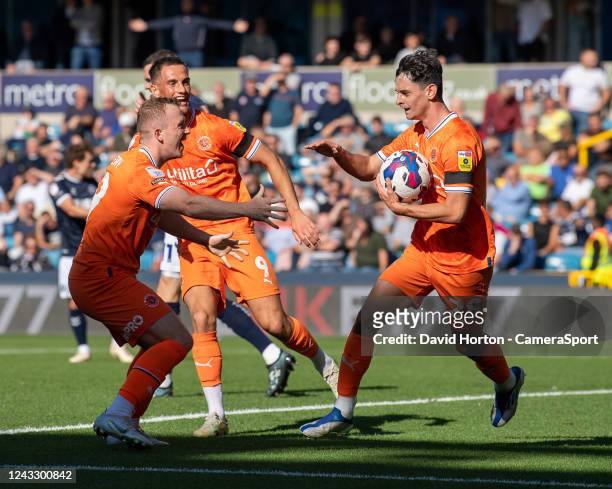 Blackpool's Charlie Patino celebrates scoring his side's first goal during the Sky Bet Championship between Millwall and Blackpool at The Den on...