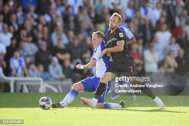 Lincoln City's Charles Vernam vies for possession with Bristol Rovers' Glenn Whelan during the Sky Bet League One between Bristol Rovers and Lincoln...