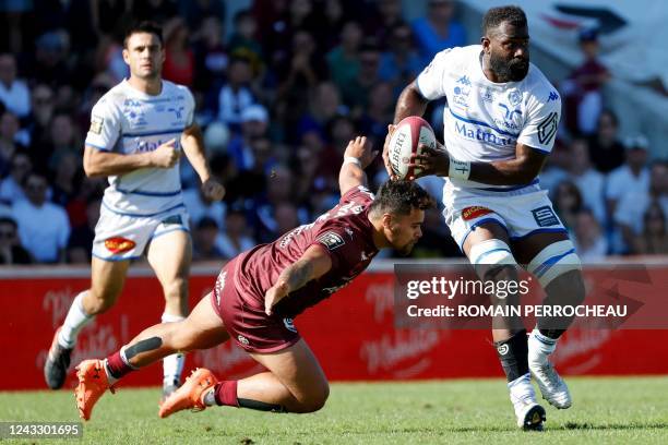 Castres' Fijian wing Josaia Raisuqe runs with the ball during the French Top14 rugby union match between Union Bordeaux-Begles and Castres Olympique...