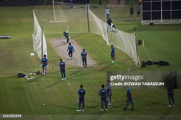 Pakistan cricket players practice at the nets during a training session at the National Cricket Stadium in Karachi on September 17 ahead of their...