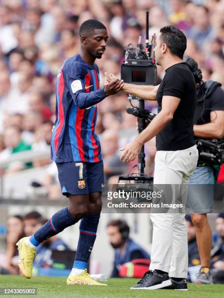 Coach Xavi of FC Barcelona Ousmane Dembele of FC Barcelona during the La Liga Santander match between FC Barcelona v Elche at the Spotify Camp Nou on...