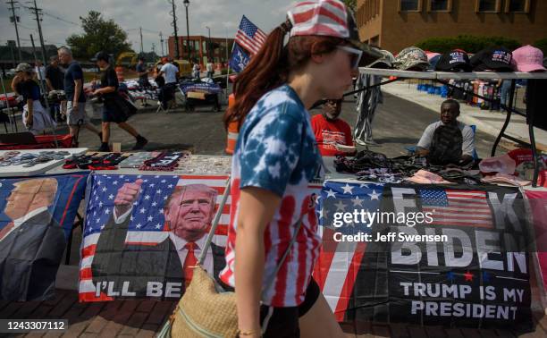 Political memorabilia is offered for sale outside the Covelli Centre before a Save America Rally, featuring former President Donald Trump, to support...