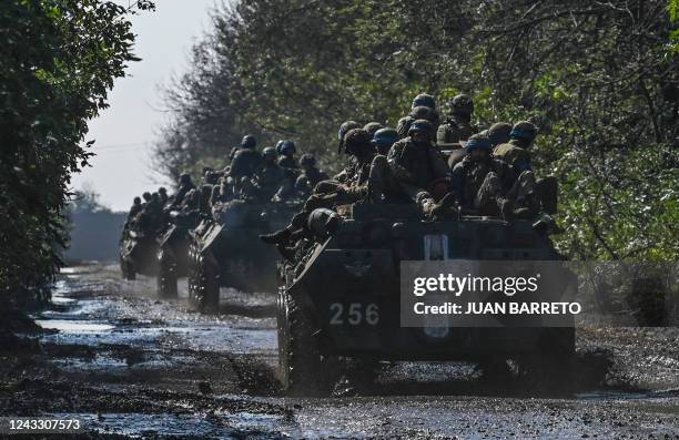 Ukrainian soldiers ride a top of infantry fighting vehicles in Novoselivka, on September 17 as the Russia-Ukraine war enters its 206th day.