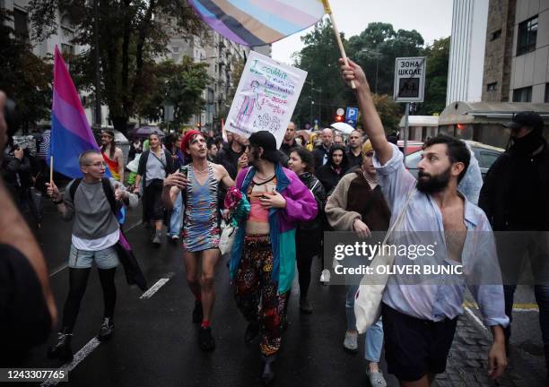 Activists march during a pride march in Belgrade, on September 17, 2022. - The situation was tense on September 17 in Belgrade where representatives...