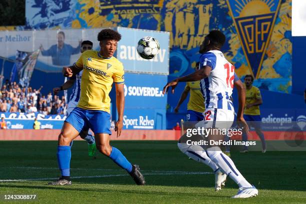 Zaidu of FC Porto, Tiago Santos of Estoril Praia battle for the ball during the Liga Portugal Bwin match between GD Estoril and FC Porto at Estadio...