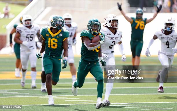 Richard Reese of the Baylor Bears carries the ball for a touchdown against the Texas State Bobcats in the second half at McLane Stadium on September...