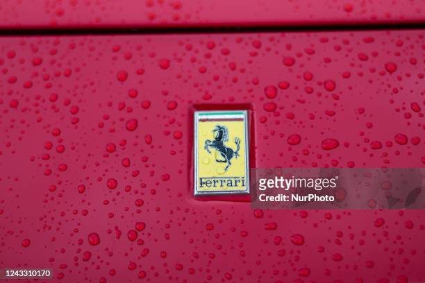 The logo of Ferrari during a Classic Cars show Coppa del Gran Sasso dItalia 2022 in Piazza Duomo, L'Aquila, Italy, on September 17, 2022.