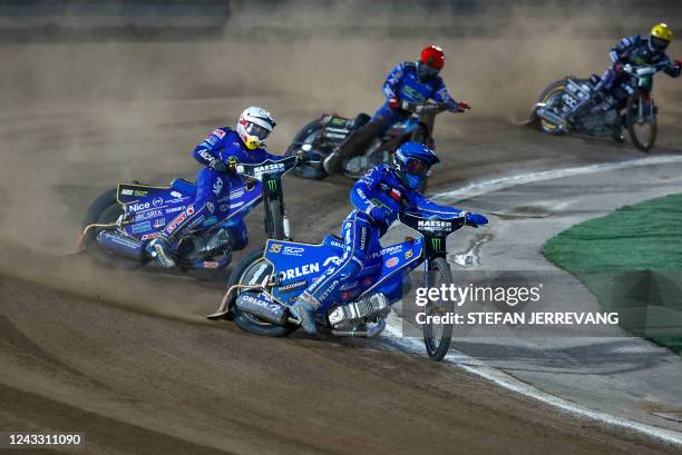 Poland's Bartosz Zmarzlik rides to win the Kaeser FIM Speedway Grand Prix round 9 of 10 at Skrotfrag Arena in Malilla, on September 17, 2022. -...