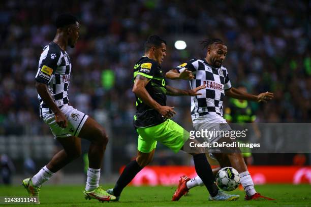 Pedro Porro of Sporting CP and Kenji Gorre of Boavista FC battle for the ball during the Liga Portugal Bwin match between Boavista and Sporting CP at...