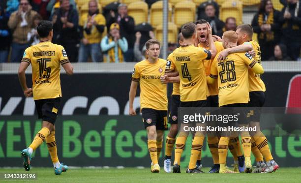 Stefan Kutschke of Dresden celebrates the opening goal with teammates during the 3.Liga match between SG Dynamo Dresden and FC Ingolstadt 04 at...