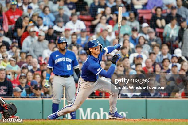 Bobby Witt Jr. #7 of the Kansas City Royals follows through on an RBI single against the Boston Red Sox during the sixth inning at Fenway Park on...