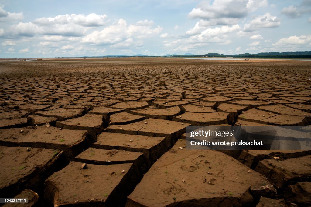 Global warming concept . Dry cracks in the land, serious water shortages. Drought concept.