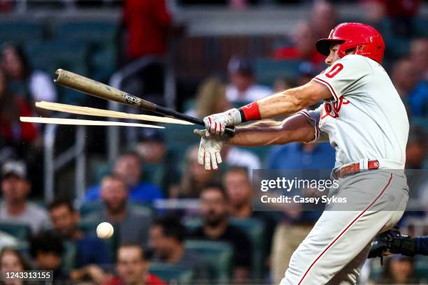 Realmuto of the Philadelphia Phillies breaks his bat into three pieces on a 3-1 count cutter from Jake Odorizzi of the Atlanta Braves in the top of...