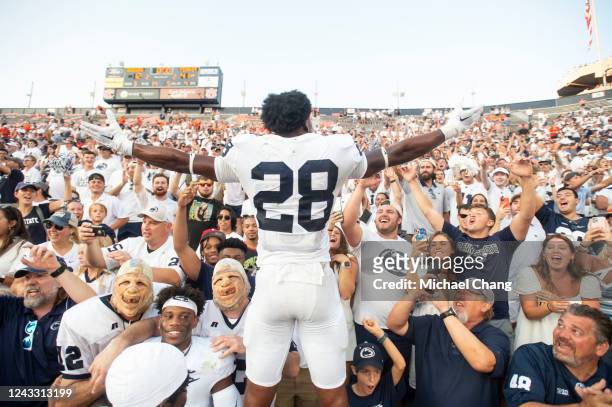 Defensive tackle Zane Durant of the Penn State Nittany Lions celebrates with fans after defeating the Auburn Tigers at Jordan-Hare Stadium on...