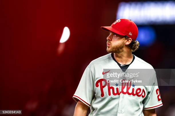 Starting pitcher Aaron Nola of the Philadelphia Phillies walks off the mound after the third inning in which he gave up a two-run home run to right...