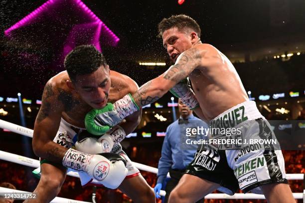 Boxer Jesse Rodriguez lands a punch on Mexican boxer Israel Gonzalez during their World Boxing Council super flyweight title bout at the T-Mobile...