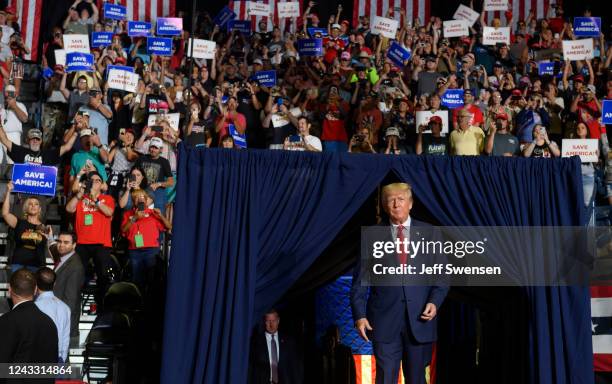 Former President Donald Trump enters the stage at a Save America Rally to support Republican candidates running for state and federal offices in the...