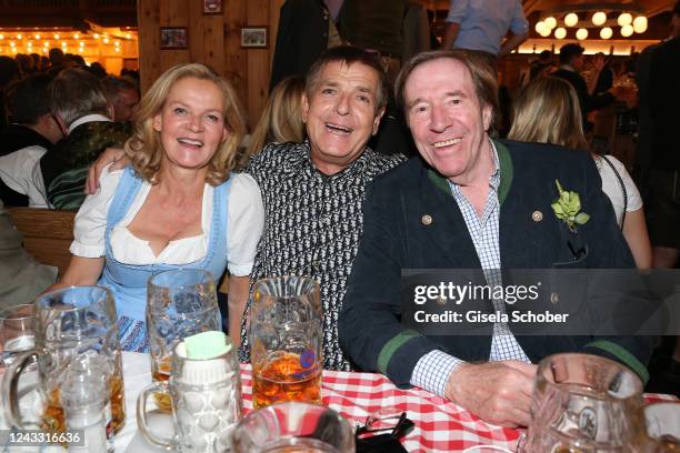 Katrin Saenger wife of Stefan Aust, Photographer and artist Andreas Gursky and Guenter Netzer during the opening day of the 187th Oktoberfest at...