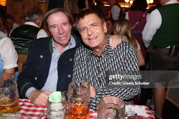 Guenter Netzer and Photographer and artist Andreas Gursky during the opening day of the 187th Oktoberfest at Schützenfestzelt Theresienwiese on...