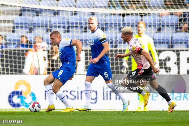 Max Power of Wigan Athletic clears the area during the Sky Bet Championship match between Wigan Athletic and Reading at the DW Stadium, Wigan on...