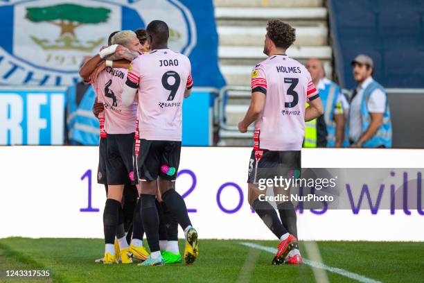 Goal 0-1 Raedings players celebrate Thomas Ince of Reading FC making it 0-1 during the Sky Bet Championship match between Wigan Athletic and Reading...