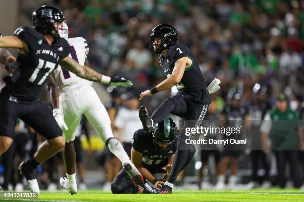 Matthew Shipley of the Hawaii Rainbow Warriors watches his field goal attempt during the second half of an NCAA football game against the Duquesne...