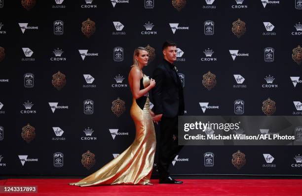 Josh Dunkley of the Bulldogs and Tippah Dwan arrive during the 2022 Brownlow Medal at Crown Palladium on September 18, 2022 in Melbourne, Australia.