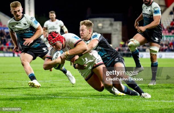 Antrim , United Kingdom - 17 September 2022; Tom Stewart of Ulster dives to score his side's second try during the United Rugby Championship match...