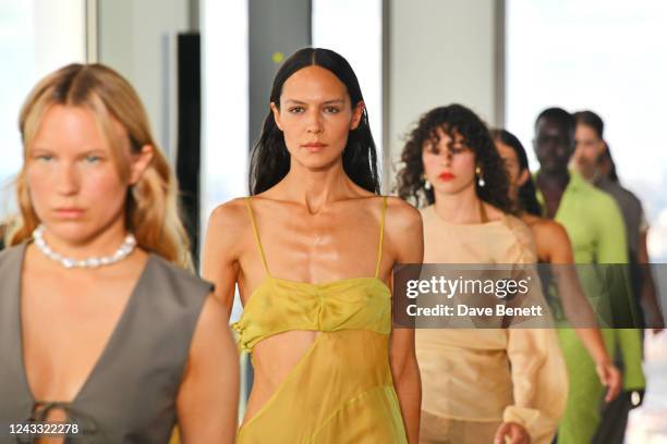 Models walks the runway at the Rejina Pyo show during London Fashion Week September 2022 on September 18, 2022 in London, England.