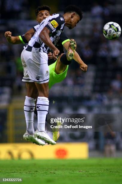 Rochinha of Sporting CP and Reggie Cannon of Boavista FC battle for the ball during the Liga Portugal Bwin match between Boavista and Sporting CP at...