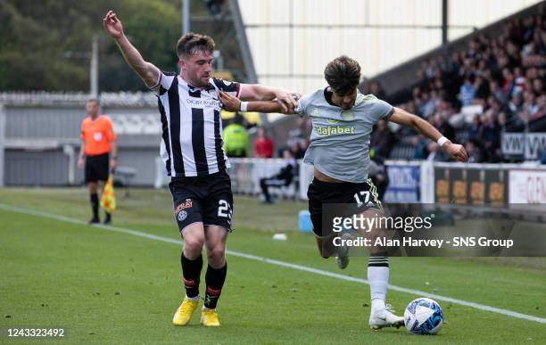 Celtic's Jota and St Mirren's Ryan Strain during a cinch Premiership match between St. Mirren and Celtic at the SMiSA Stadium, on September 18 in...