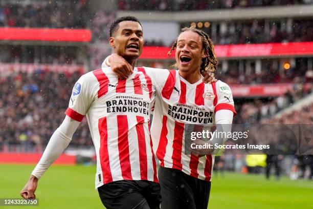 Cody Gakpo of PSV celebrates 2-1 with Xavi Simons of PSV during the Dutch Eredivisie match between PSV v Feyenoord at the Philips Stadium on...