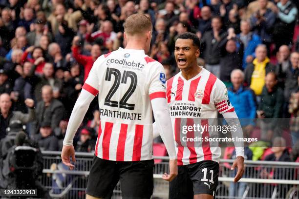 Jarrad Branthwaite of PSV celebrates 1-1 with Cody Gakpo of PSV during the Dutch Eredivisie match between PSV v Feyenoord at the Philips Stadium on...