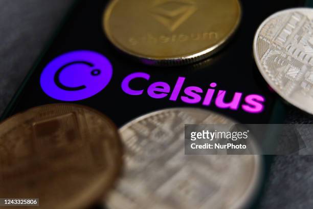 Celsius logo displayed on a phone screen and representation of cryptocurrencies are seen in this illustration photo taken in Krakow, Poland on...