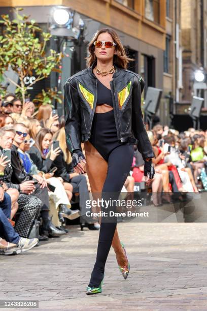 Izabel Goulart walks the runway at the David Koma SS23 show during London Fashion Week September 2022 on September 18, 2022 in London, England.
