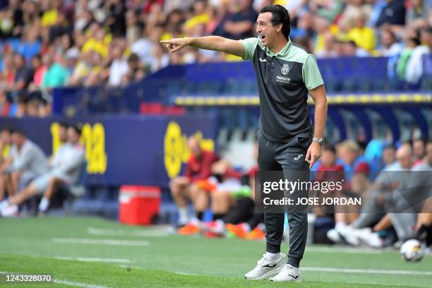 Villarreal's Spanish coach Unai Emery gestures during the Spanish League football match between Villarreal CF and Sevilla FC at the Ciutat de...