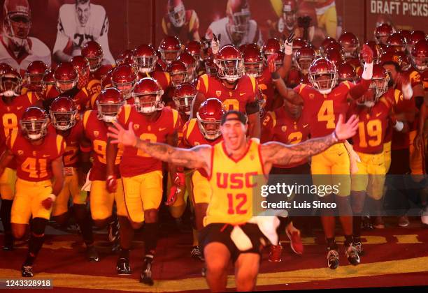 The USC Trojans take the field for the game against Fresno State at the Coliseum in Los Angeles. On Saturday night, Sep. 17, 2022. (Luis Sinco / Los...