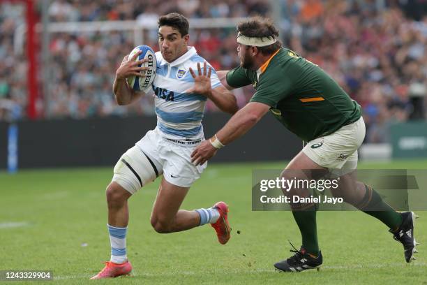 Jeronimo De La Fuente of Argentina dribbles past Frans Malherbe of South Africa during a match between Argentina and South Africa national rugby...