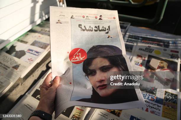 View of Iranian newspapers with headlines of the death of 22 years old Mahsa Amini who died after being arrested by morality police allegedly not...