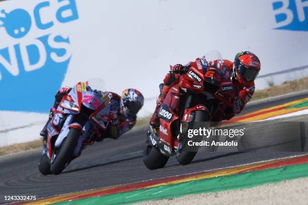 Francesco Bagnaia of Italy and Ducati Lenovo Team and Enea Bastianini of Italy and Gresini Racing MotoGP during the race of Gran Premio Animoca...