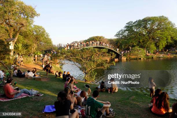 People enjoy a sunny and warm Sunday at Parque do Ibirapuera in Sao Paulo, Brazil, on September 18, 2022.