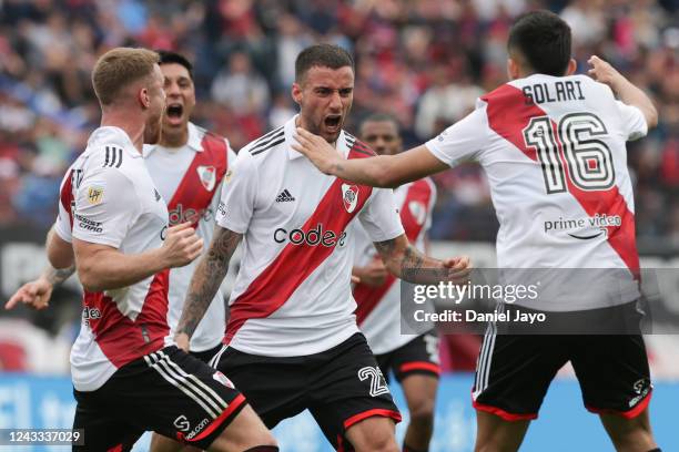 Emanuel Mammana of River Plate celebrates with teammates after scoring the first goal of his team during a match between San Lorenzo and River Plate...