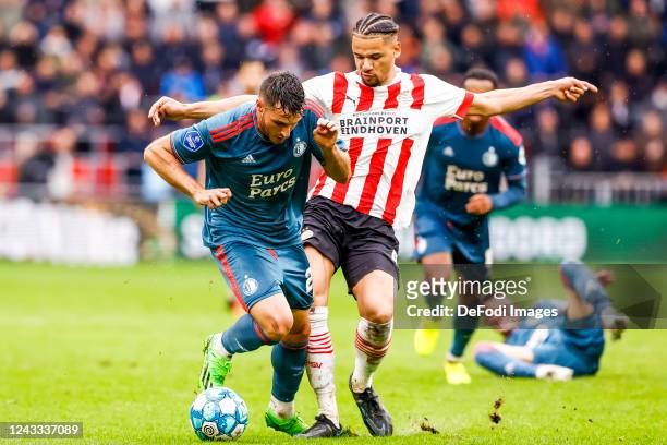 Armando Obispo of PSV Eindhoven and Oussama Idrissi of Feyenoord Rotterdam Battle for the ball during the Dutch Eredivisie match between PSV...