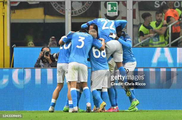 Giovanni Simeone of SSC Napoli celebrates goal with teammates during the Serie A match between AC Milan and SSC Napoli at Stadio Giuseppe Meazza on...