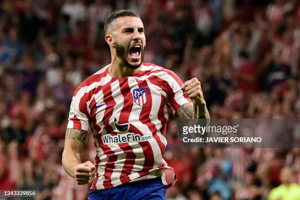Atletico Madrid's Spanish defender Mario Hermoso celebrates after scoring during the Spanish League football match between Club Atletico de Madrid...