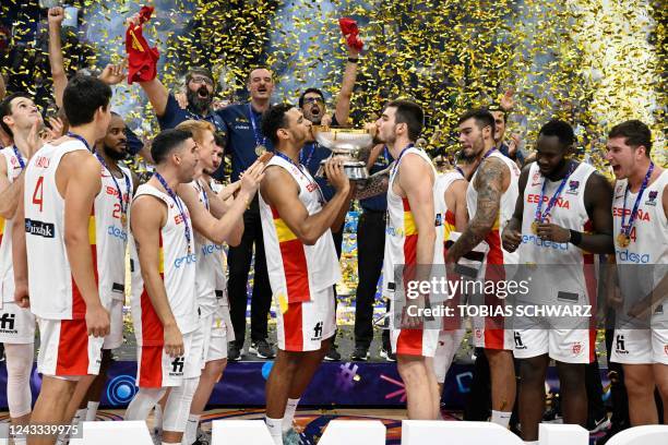 Spain's team celebrates with the trophy after the FIBA Eurobasket 2022 final basketball match between Spain and France in Berlin on September 18,...
